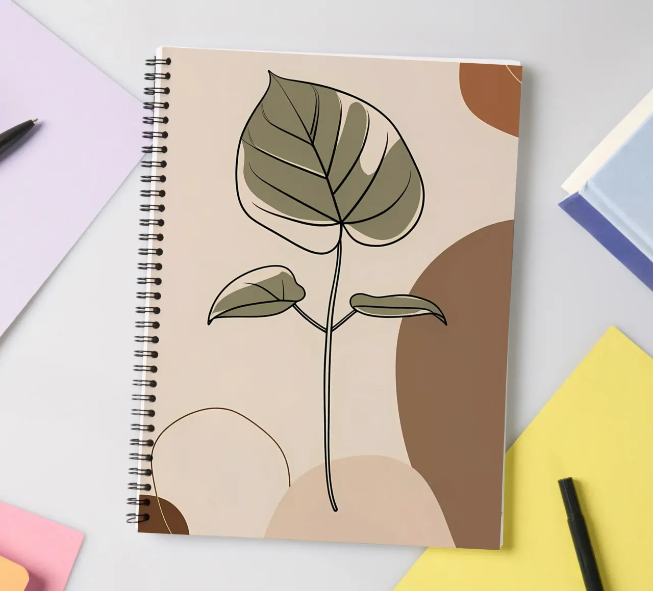 Minimalist one line drawing of a single Philodendron leaf spiral notebook by Bloom And Brush