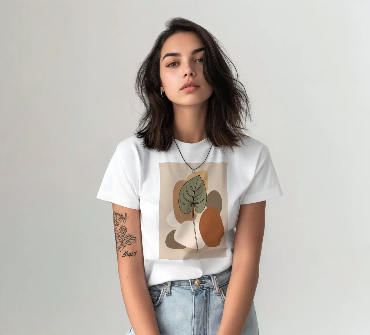 Minimalist one line drawing of a single Philodendron leaf t-shirt by Bloom And Brush