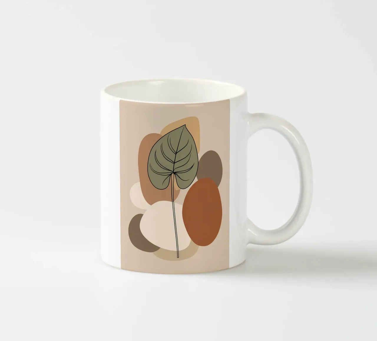 Disegno minimalista a una linea di una singola foglia di filodendro tazza in ceramica da Bloom And Brush