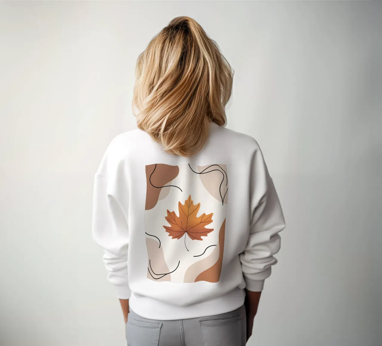 Minimalist one line drawing of a single maple leaf sweatshirt by Bloom And Brush
