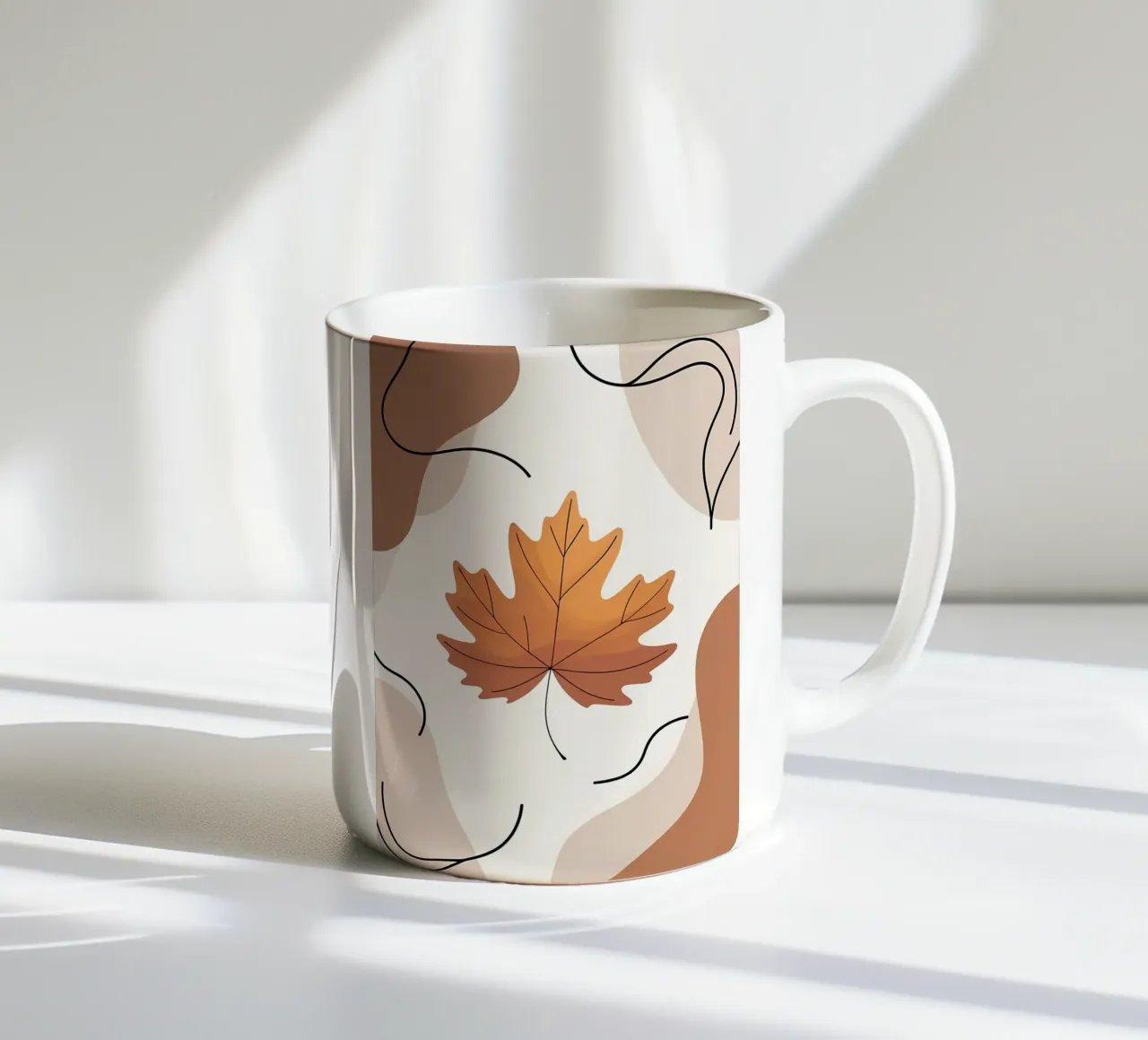 Minimalist one line drawing of a single maple leaf ceramic mug by Bloom And Brush