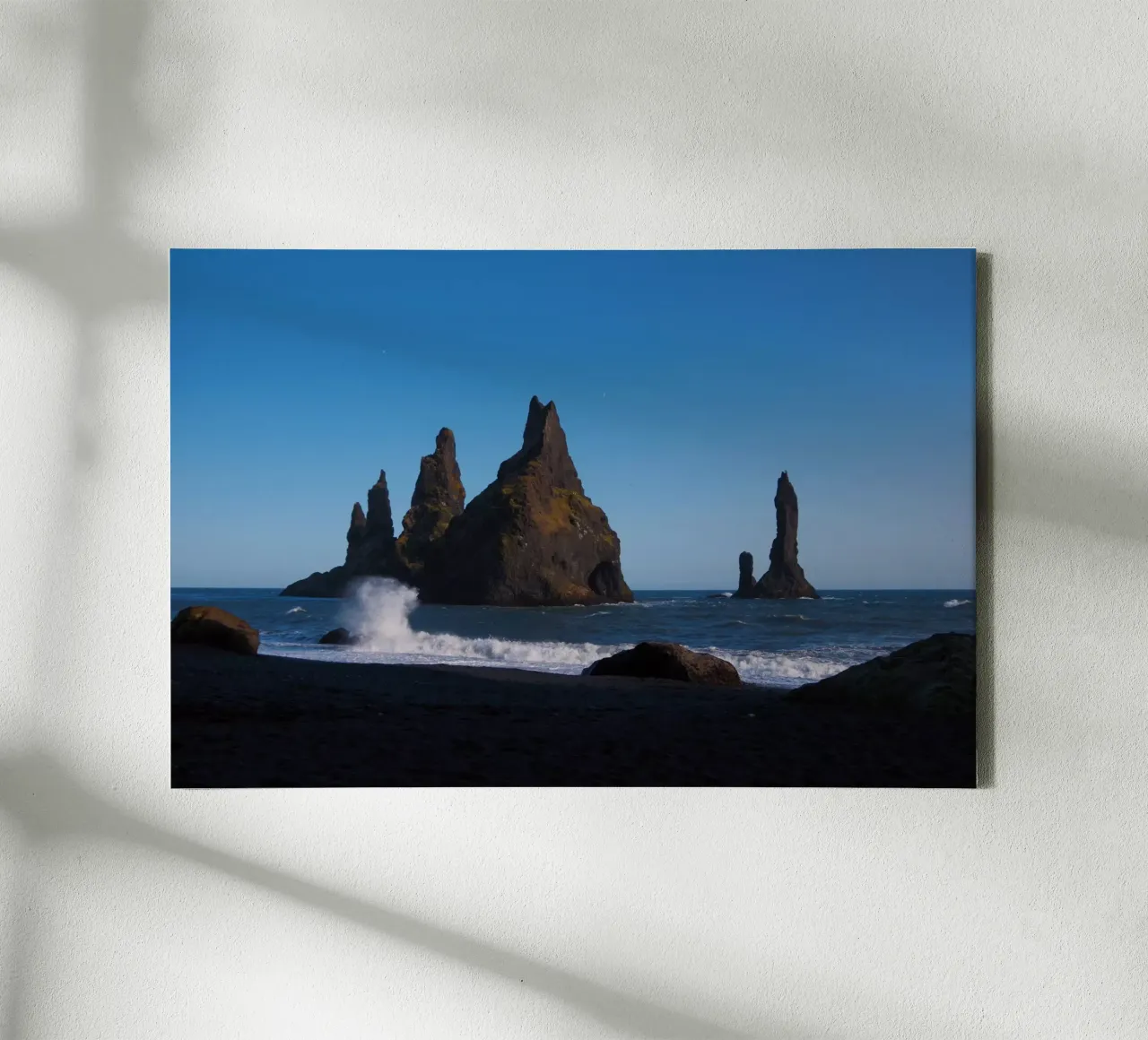 Rocks in the sea on Iceland's coast canvas with Floater frame by Fjöllart