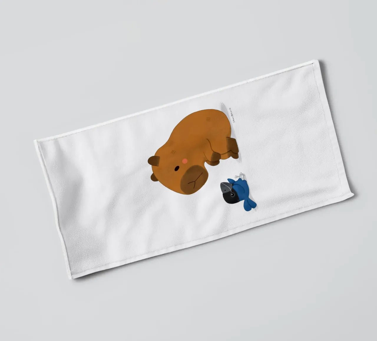 Capybara and Bird talking towel by julianamotzko