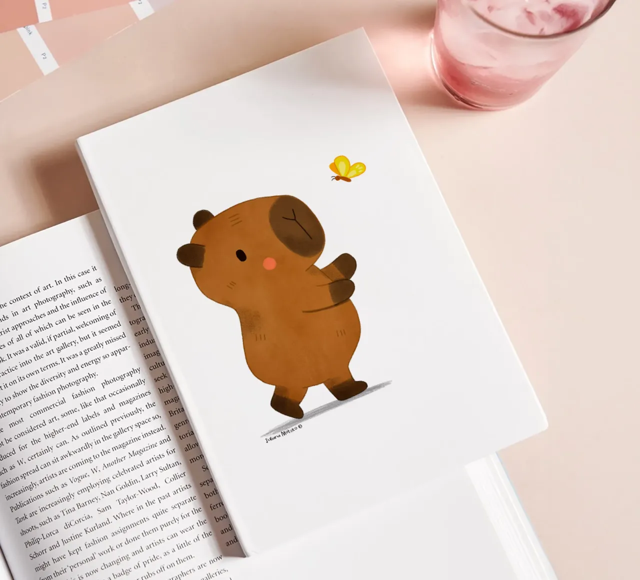 Capybara and Butterfly notebook by julianamotzko