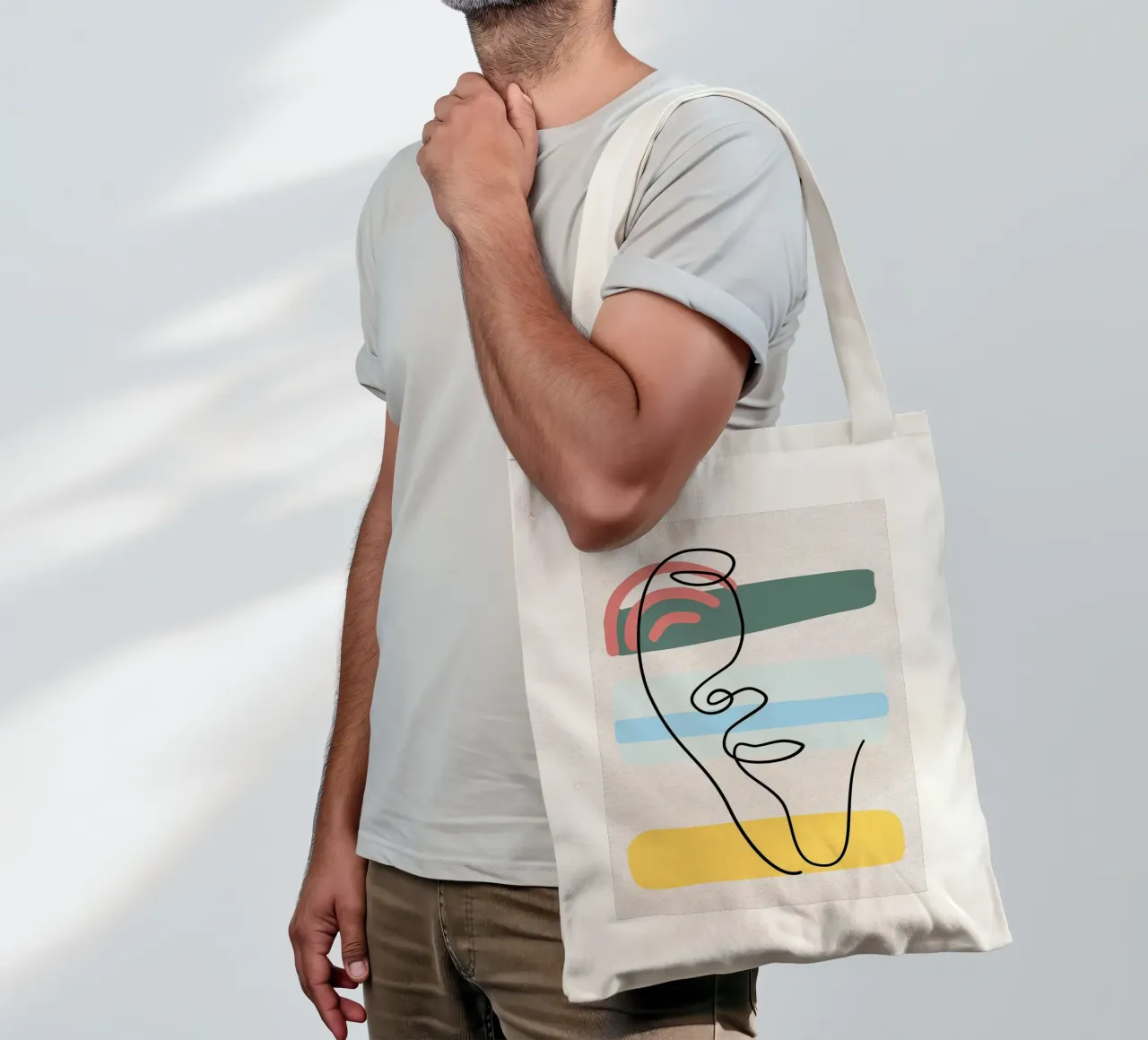 Line art astratte di volti con colori borsa in juta da apple crumble