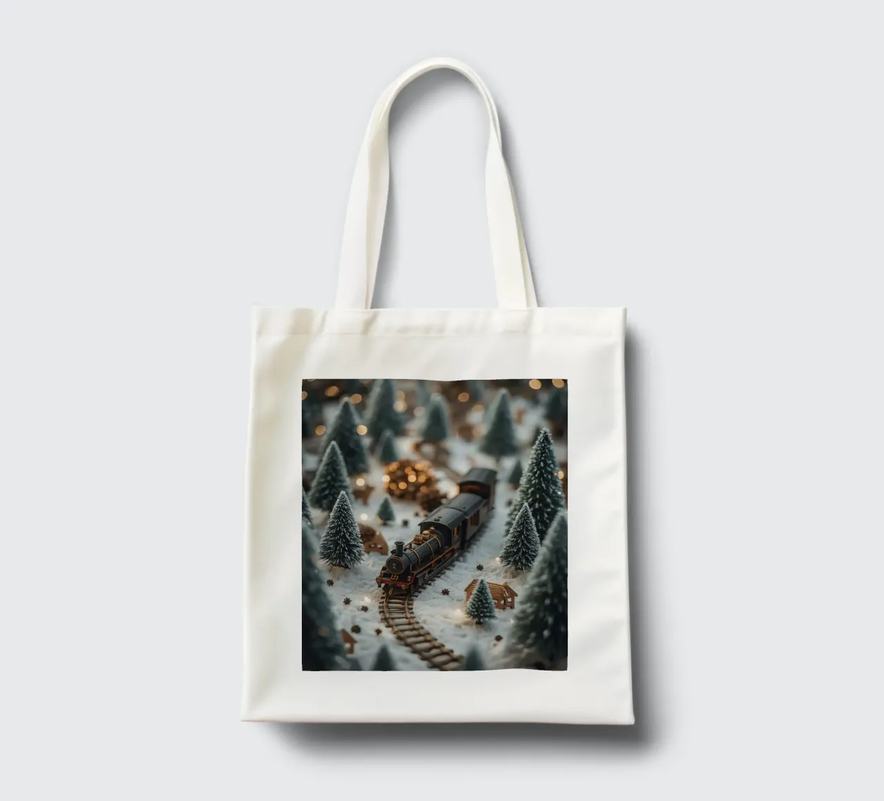 Treno in miniatura in un paesaggio innevato con alberi e luci borsa in juta da DesignDoodle