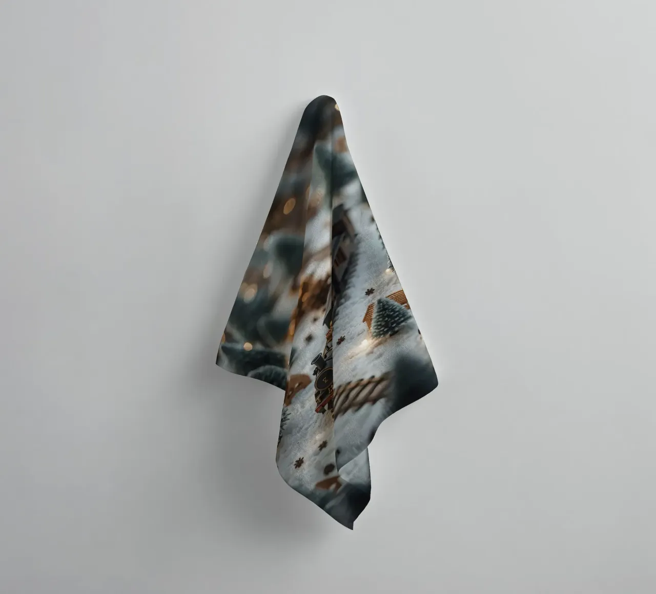 Miniature Train in Snowy Landscape with Trees and Lights towel by DesignDoodle
