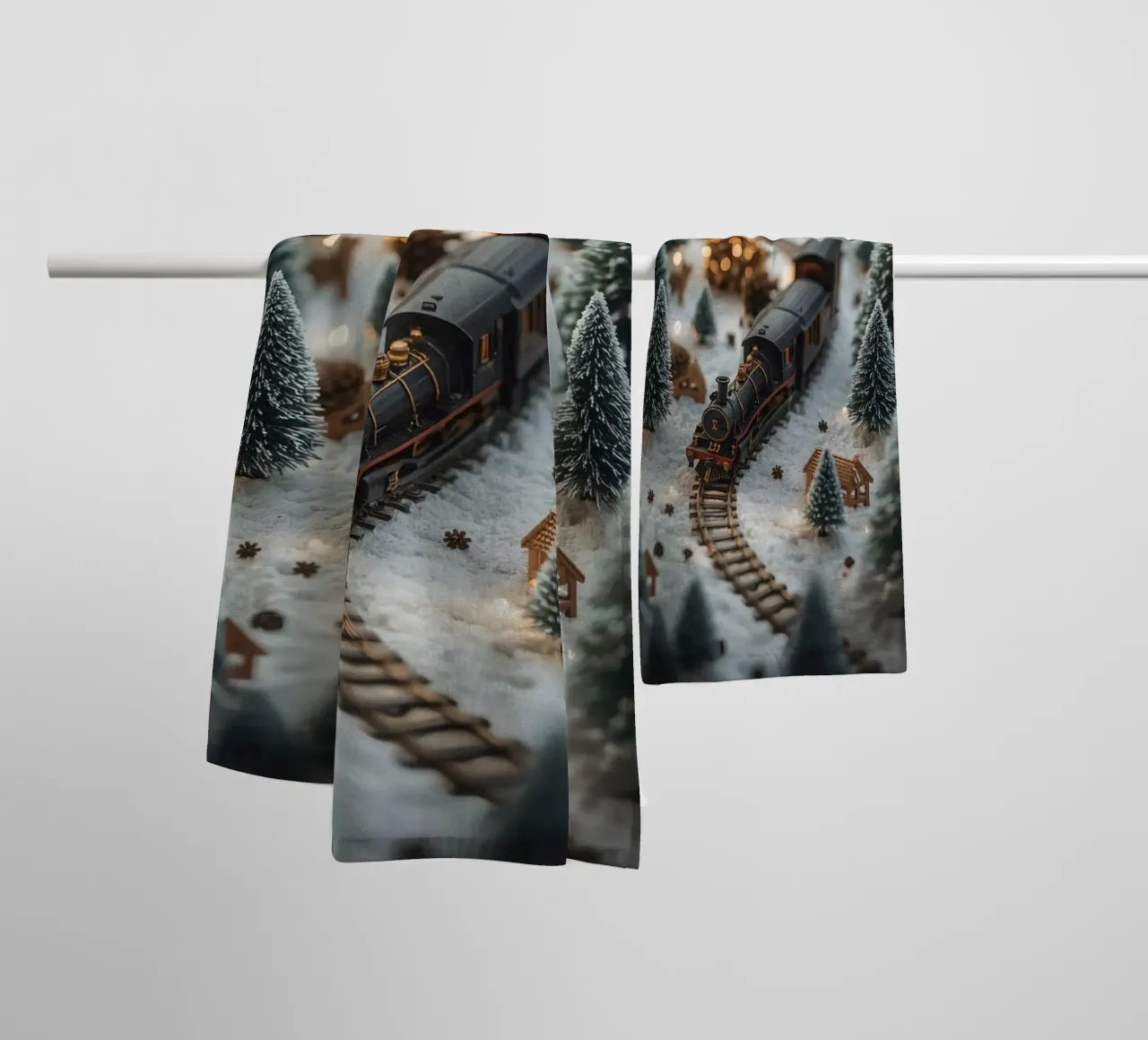 Miniature Train in Snowy Landscape with Trees and Lights towel by DesignDoodle