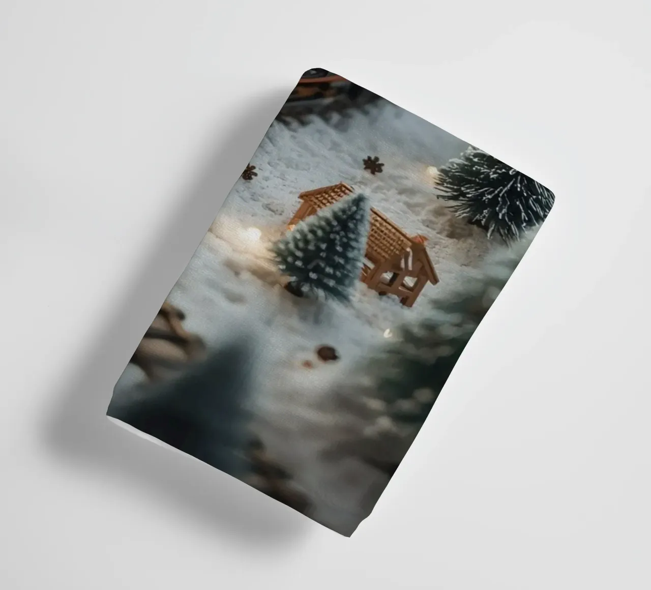 Miniature Train in Snowy Landscape with Trees and Lights towel by DesignDoodle
