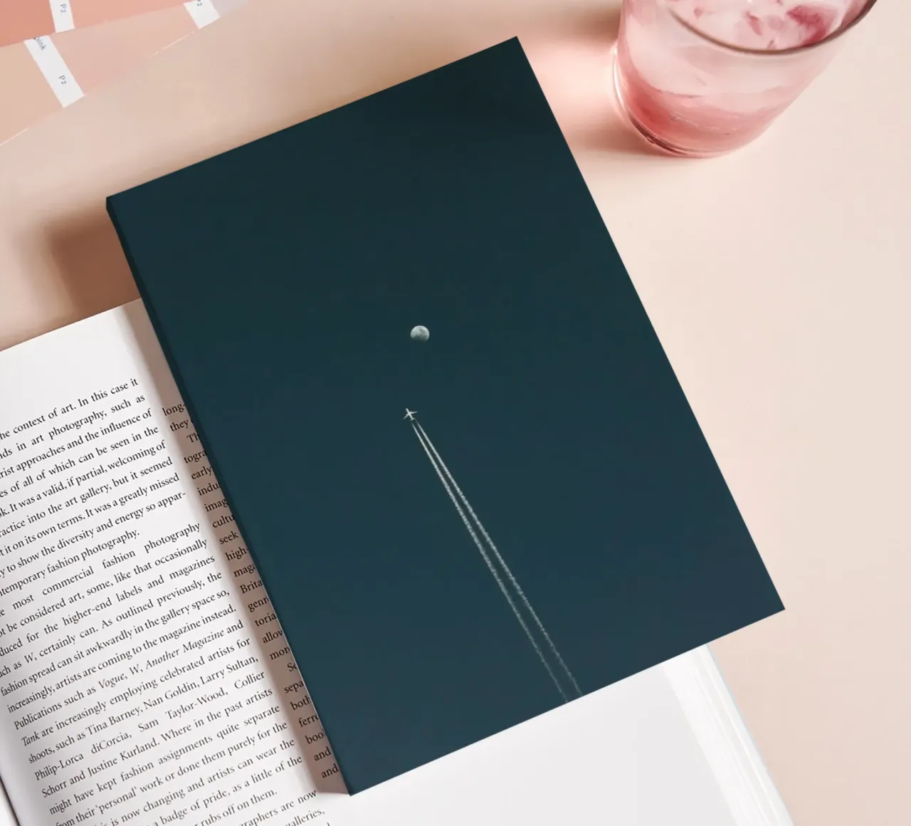 plane with moon notebook by Fost