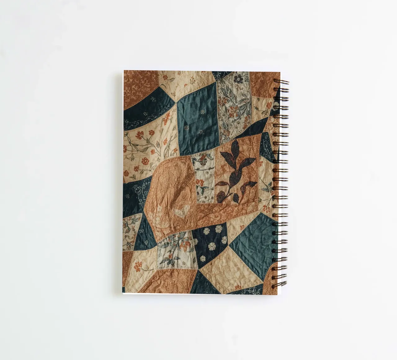 Patchwork Quilt with Floral and Abstract Patterns spiral notebook by DesignDoodle