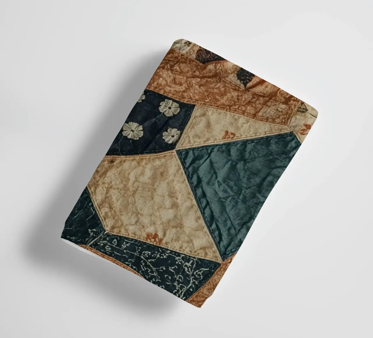 Patchwork Quilt with Floral and Abstract Patterns towel by DesignDoodle