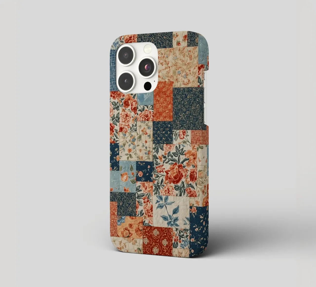 Patchwork-Quilt mit floralen und geometrischen Mustern iPhone Hülle von DesignDoodle