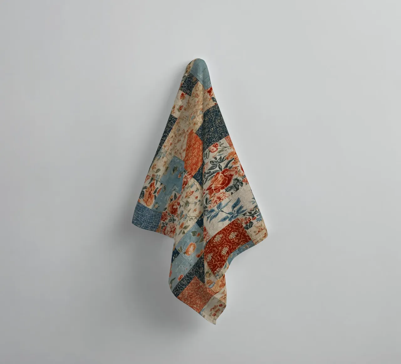 Patchwork Quilt with Floral and Geometric Patterns towel by DesignDoodle