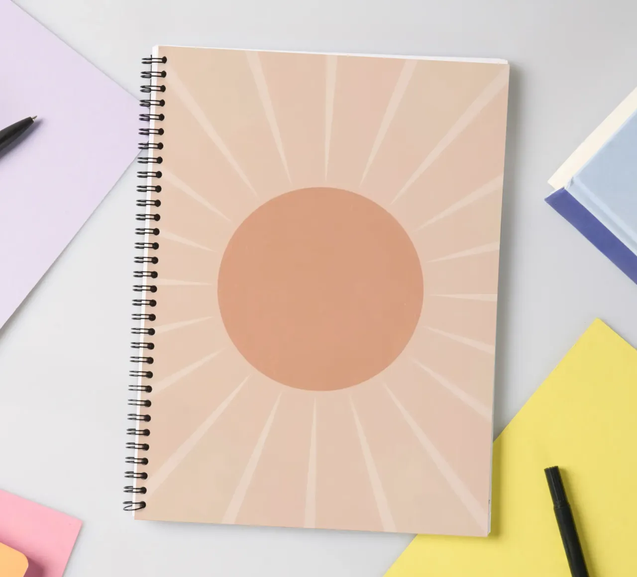 Peach Circle and Rays Background spiral notebook by DesignDoodle