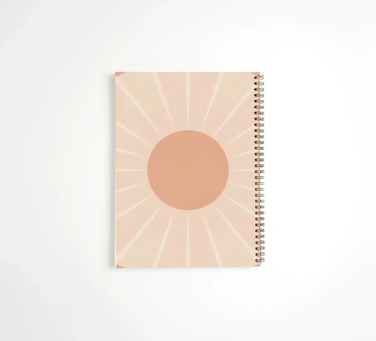 Peach Circle and Rays Background spiral notebook by DesignDoodle