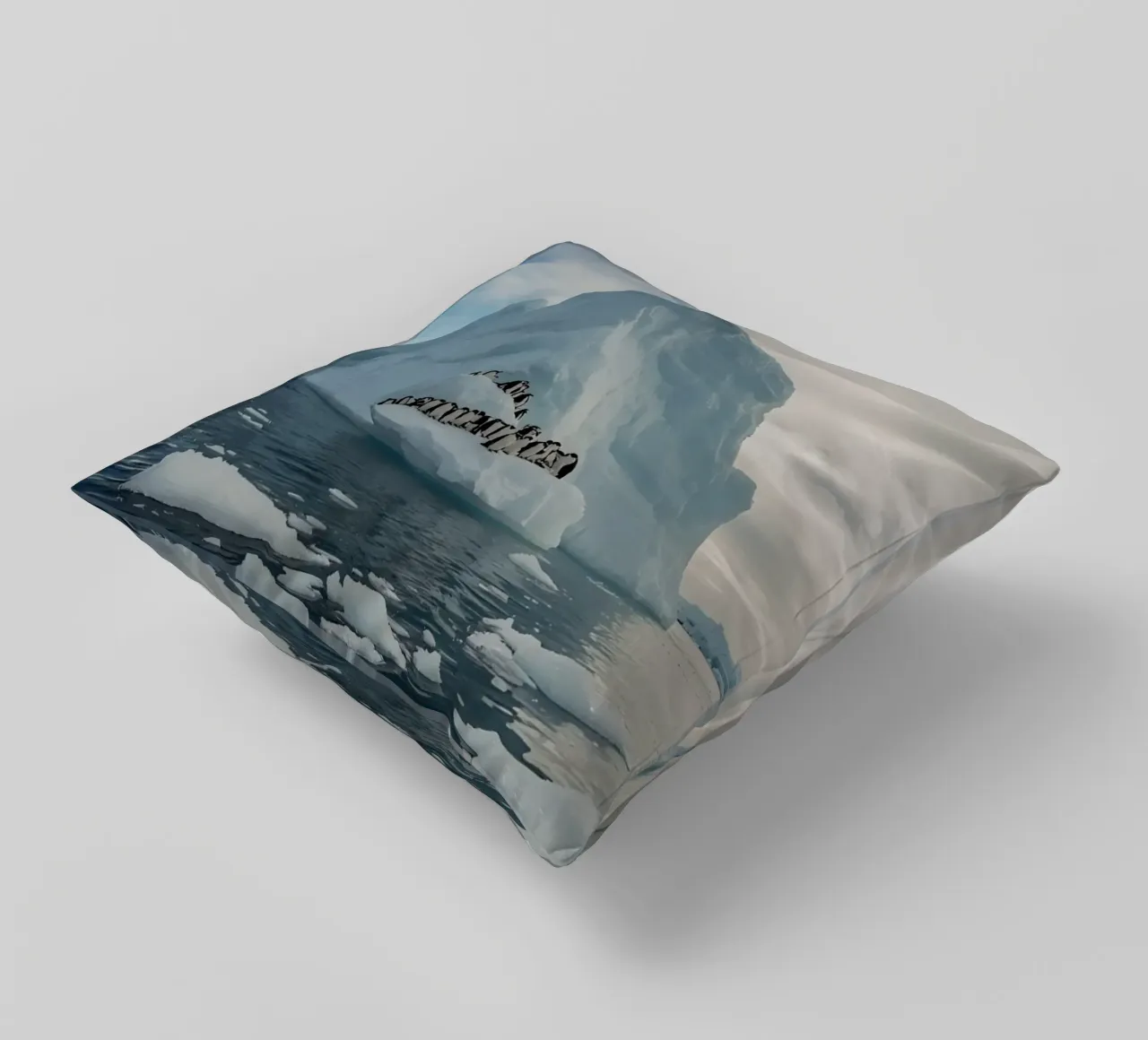 Pinguini su un iceberg in acque fredde cuscino da DesignDoodle