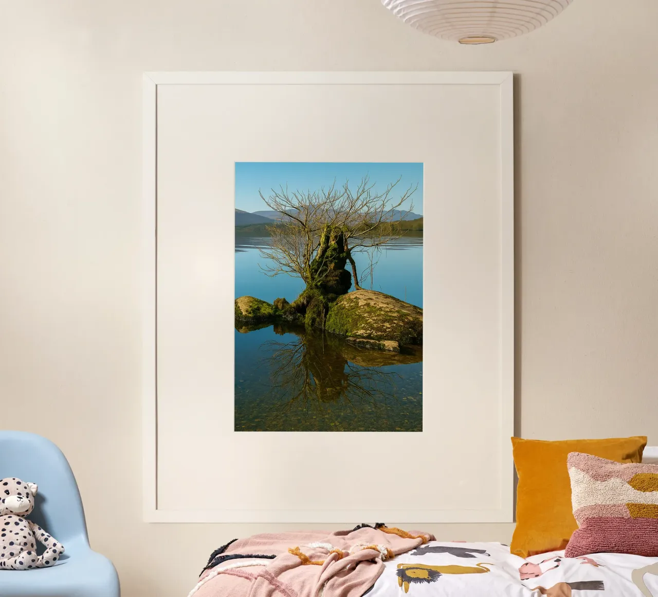 dry tree in the middle of lake hahnemühle by tamarind