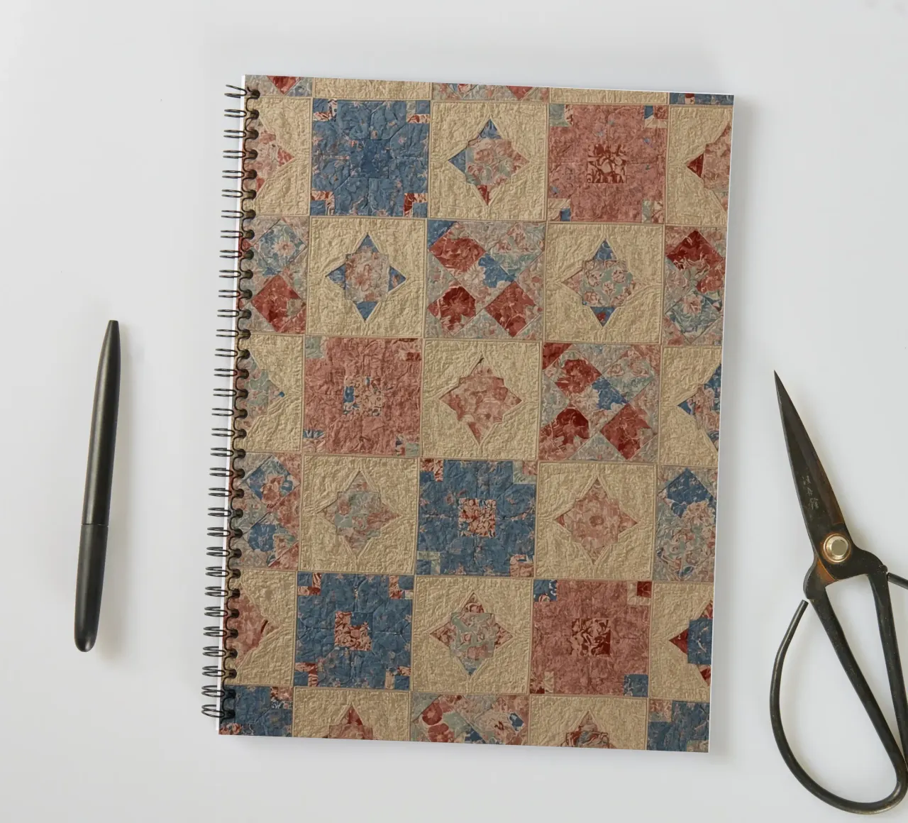 Quilted Fabric with Geometric and Floral Patterns spiral notebook by DesignDoodle