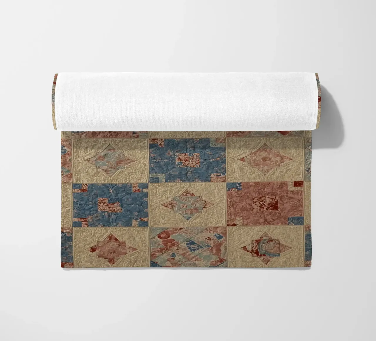 Quilted Fabric with Geometric and Floral Patterns beach towel by DesignDoodle