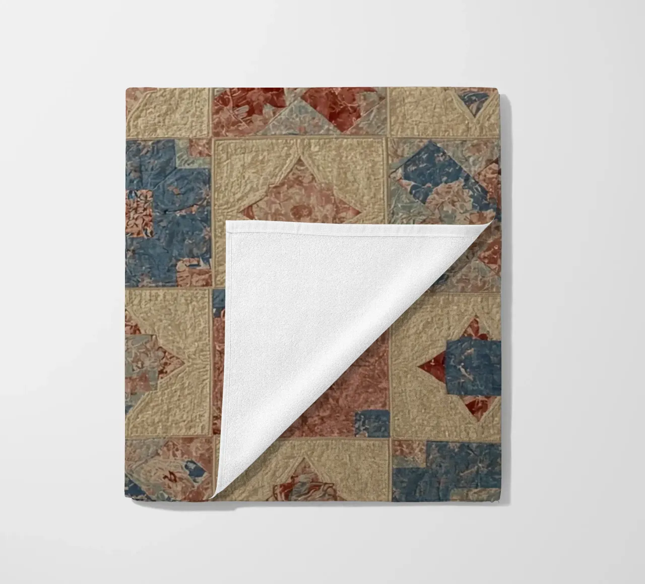 Quilted Fabric with Geometric and Floral Patterns beach towel by DesignDoodle