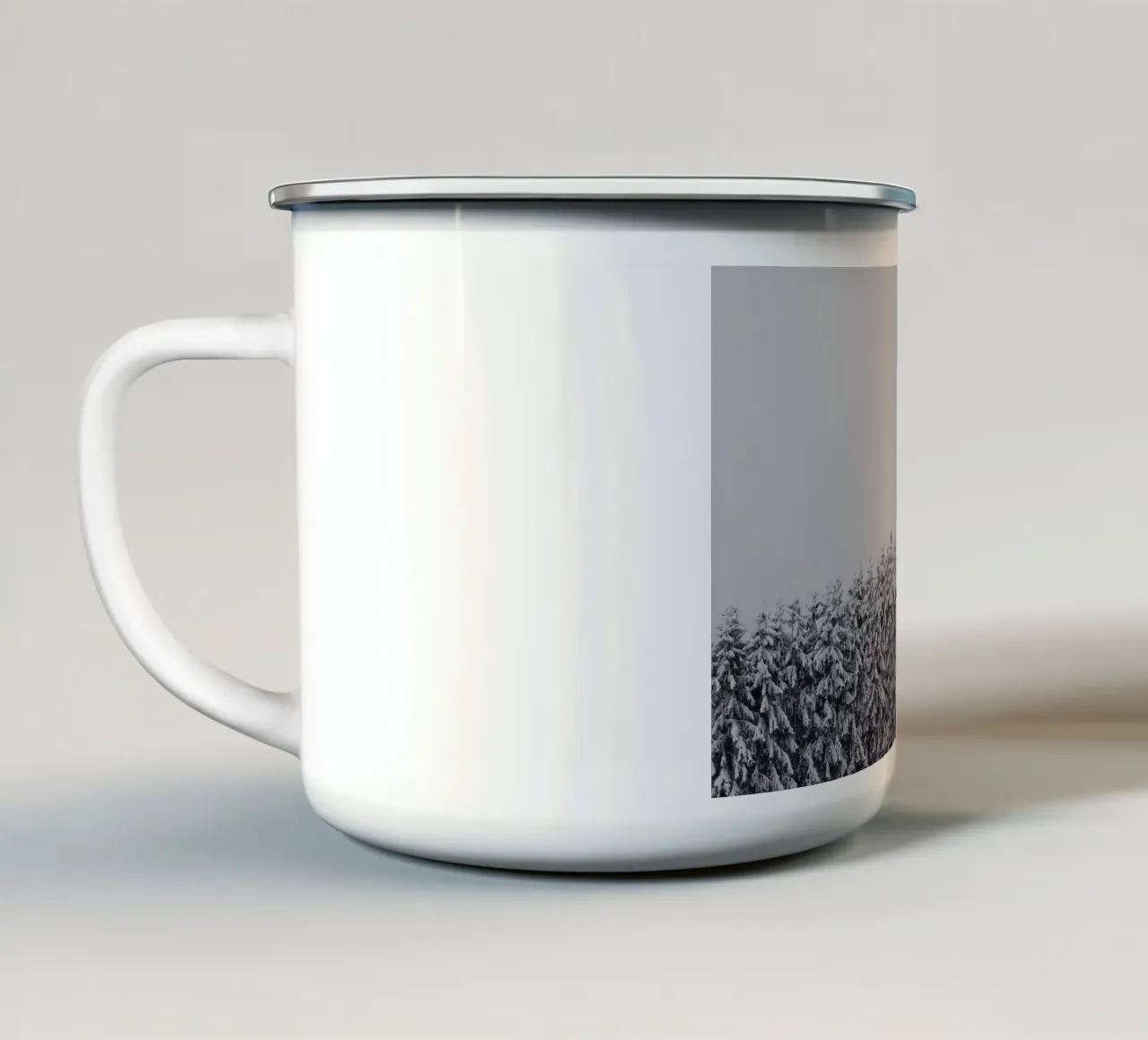 Snow-covered trees enamel mug by Fjöllart