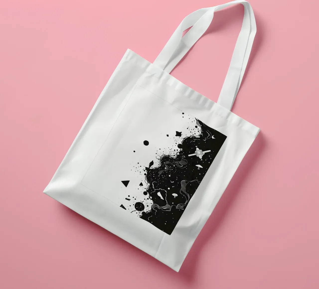 Silhouette on Cliff Edge with Abstract Celestial Forms tote bag by DesignDoodle