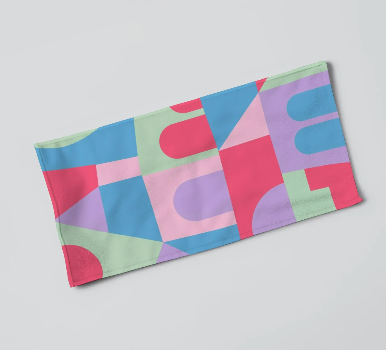 Geometric Townscape towel by Kim Hubball Studio