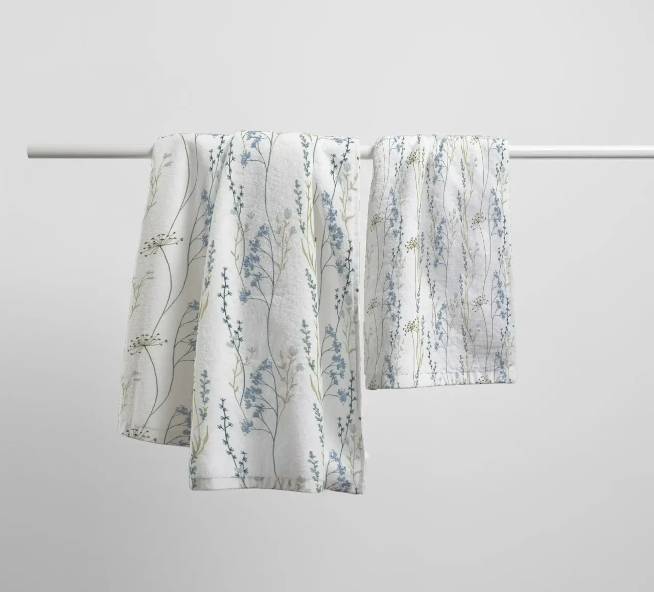 Delicate pattern of flowers and plants towel by The joy of home