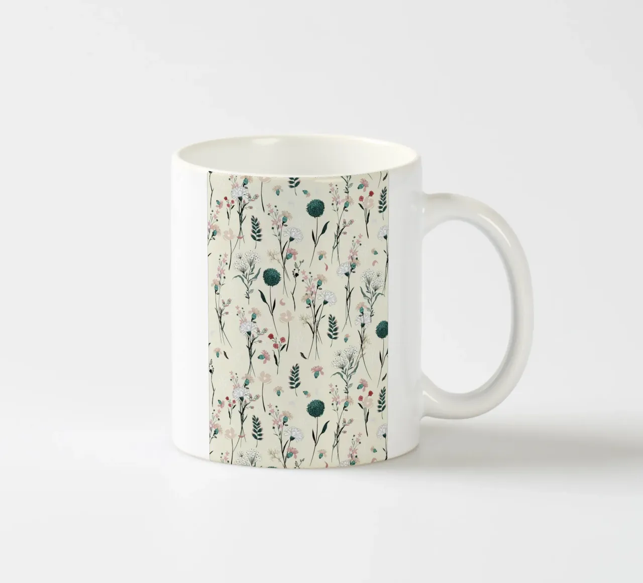 Delicate pattern of flowers and plants on a soft background ceramic mug by The joy of home