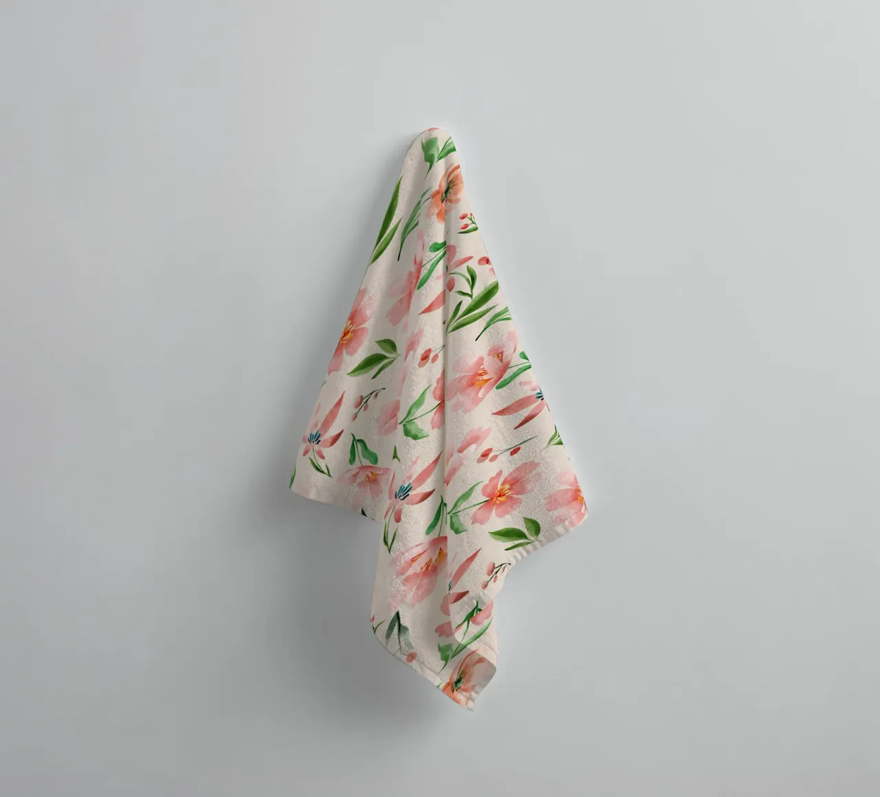 Delicate pattern of flowers and plants on a salmon backgroun towel by The joy of home
