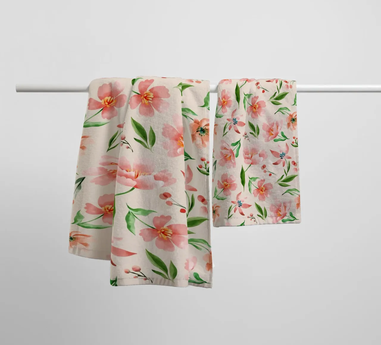 Delicate pattern of flowers and plants on a salmon backgroun towel by The joy of home