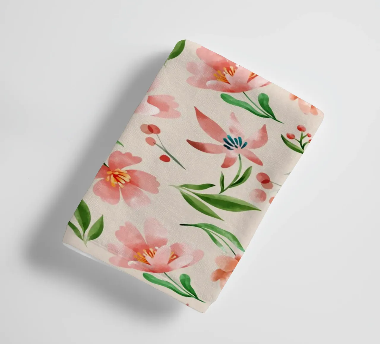 Delicate pattern of flowers and plants on a salmon backgroun towel by The joy of home