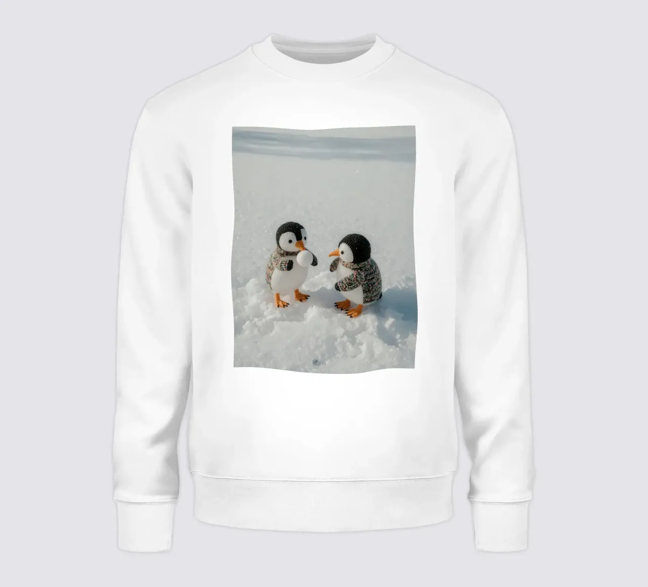 Due pinguini a maglia sulla neve felpa da DesignDoodle