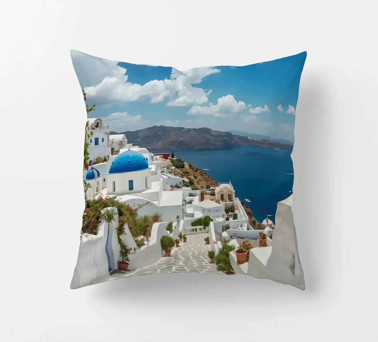 Edifici imbiancati e sentiero di pietra a Santorini cuscino da DesignDoodle