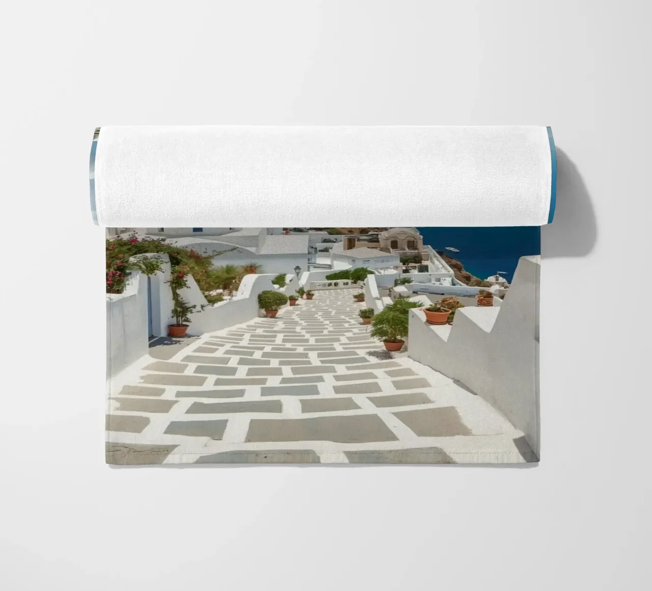 Whitewashed Buildings and Stone Pathway in Santorini beach towel by DesignDoodle