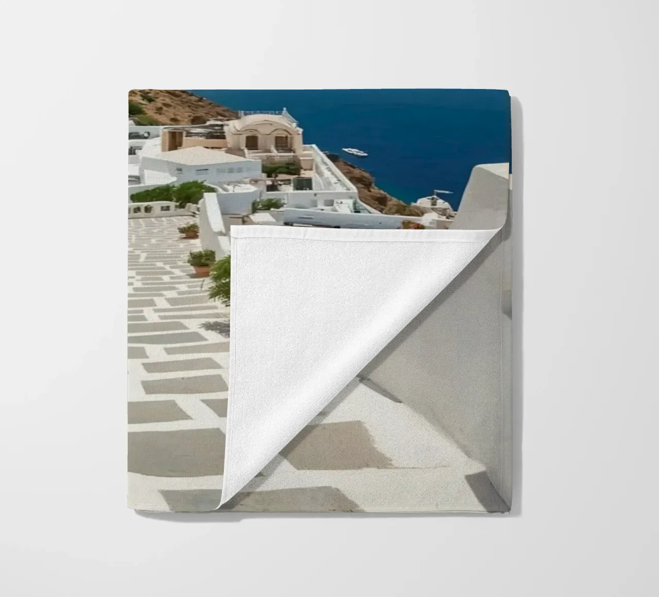 Whitewashed Buildings and Stone Pathway in Santorini beach towel by DesignDoodle