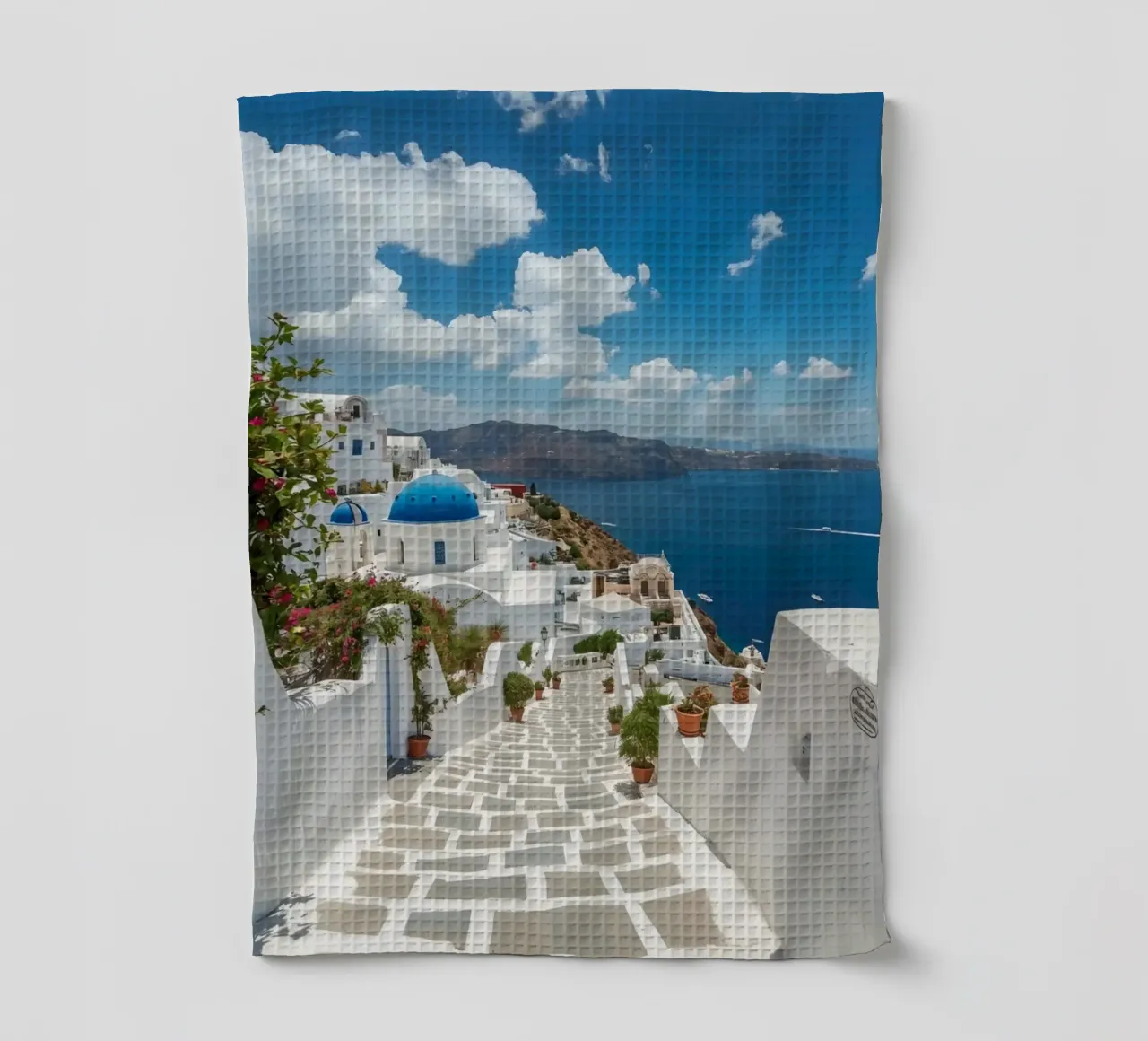 Whitewashed Buildings and Stone Pathway in Santorini tea towel by DesignDoodle