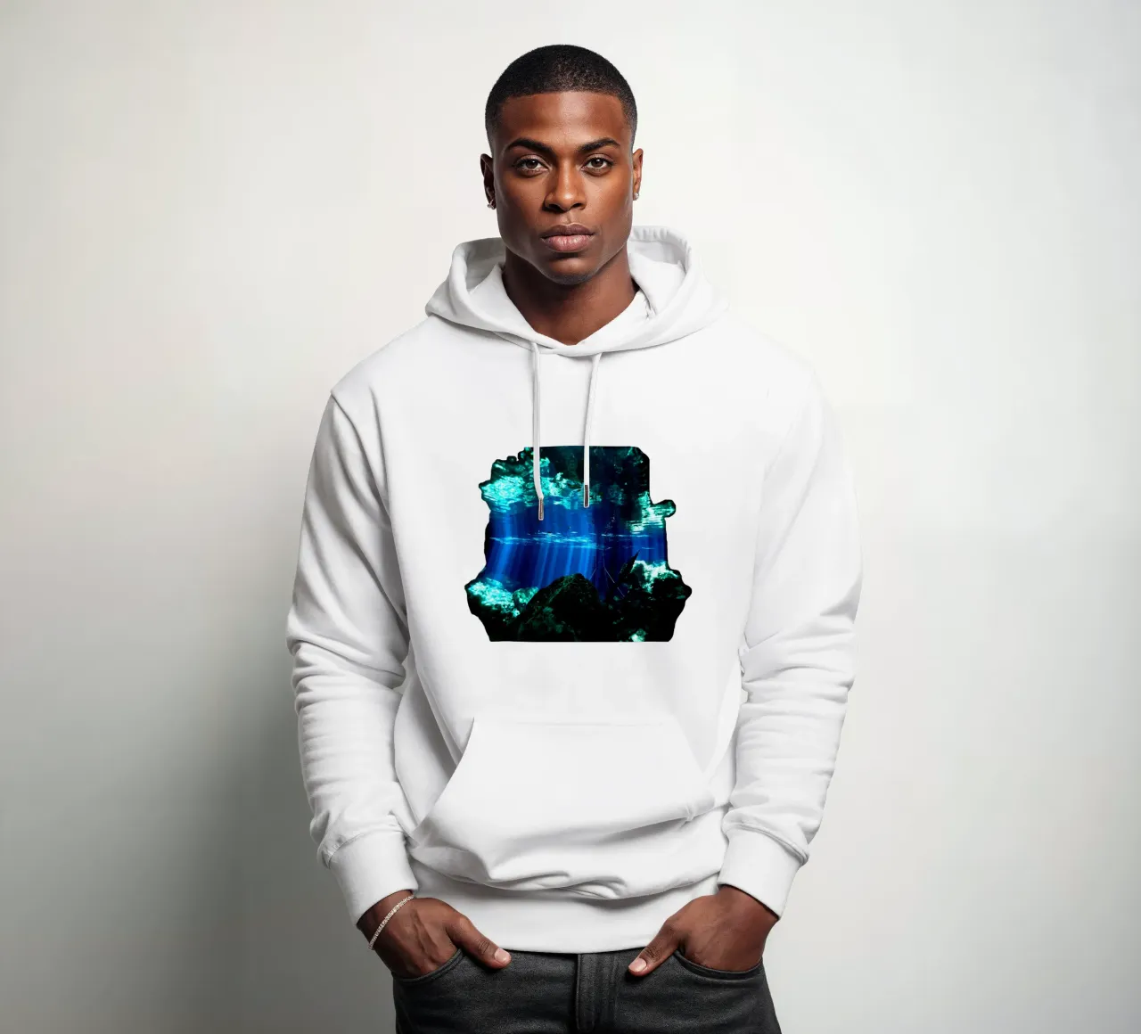 Raggi di sole in un cenote in Messico felpa con cappuccio da DiveDuke