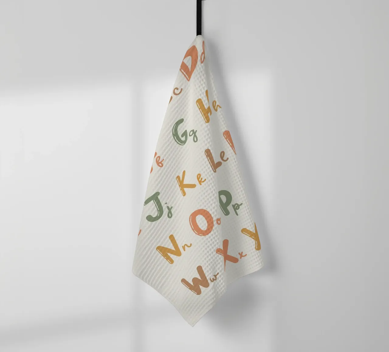 Tableau de l'alphabet avec des lettres colorées torchon de bazi