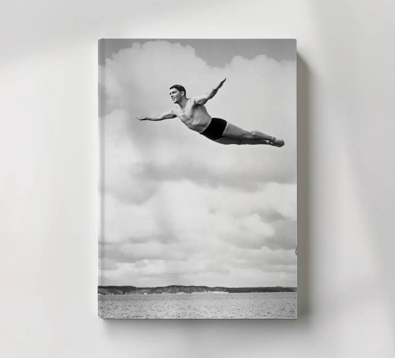 Springboard diver in the clouds notebook by Brant Varner