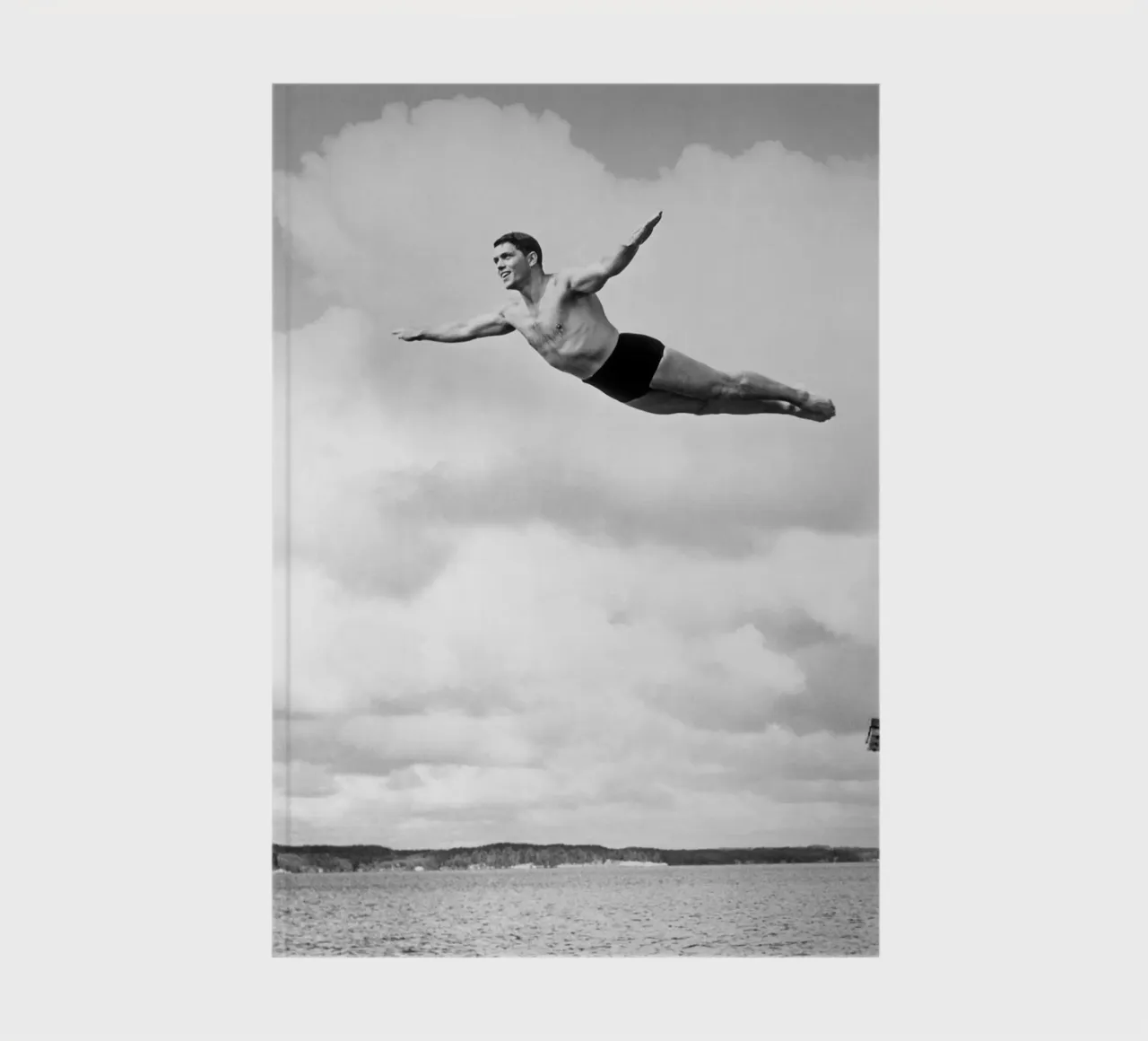 Springboard diver in the clouds notebook by Brant Varner