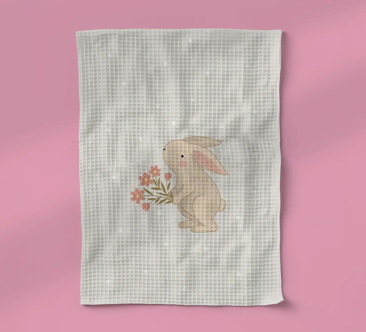 Lapin avec des fleurs torchon de apple crumble