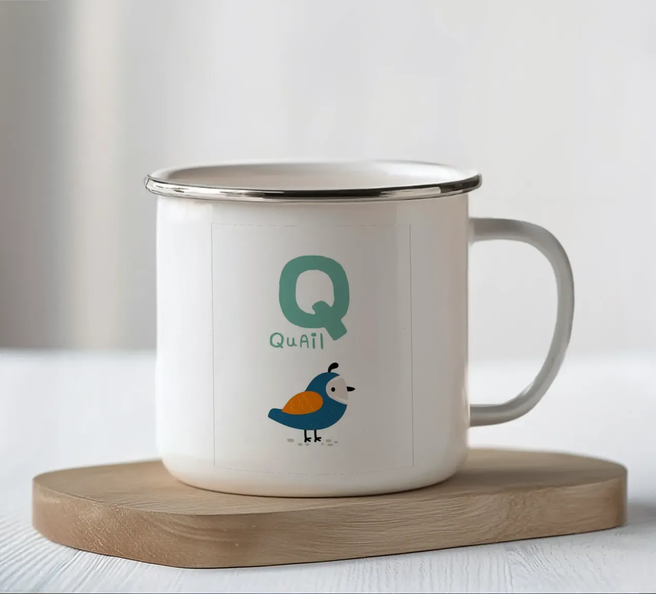 La quaglia e la lettera Q tazza in smalto da Noah Bouchard