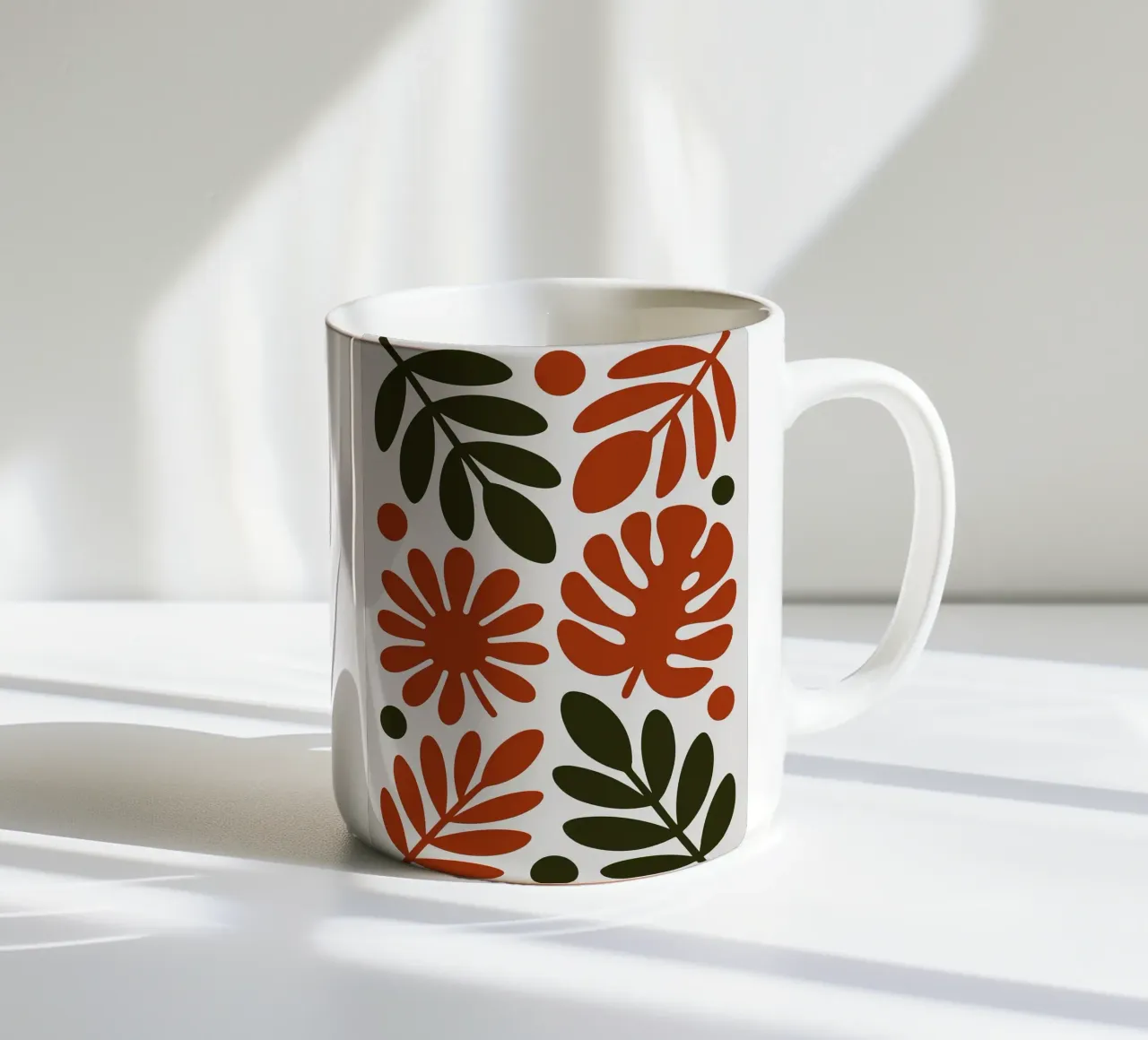 Motivo botanico con foglie e fiori tazza in ceramica da Damion Francis