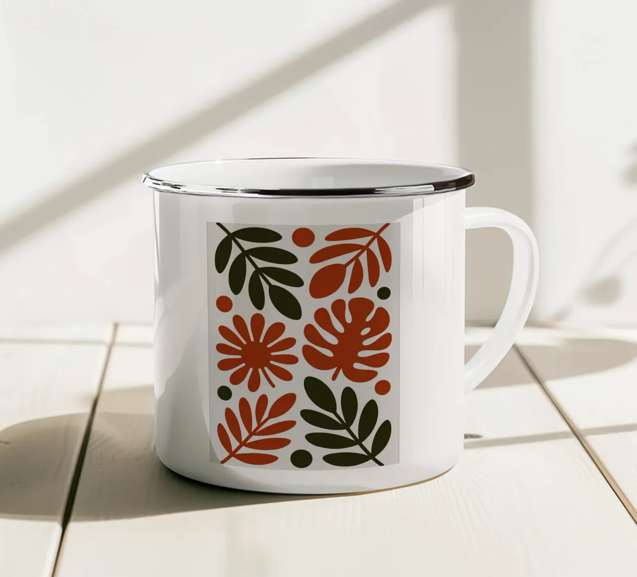 Motivo botanico con foglie e fiori tazza in smalto da Damion Francis