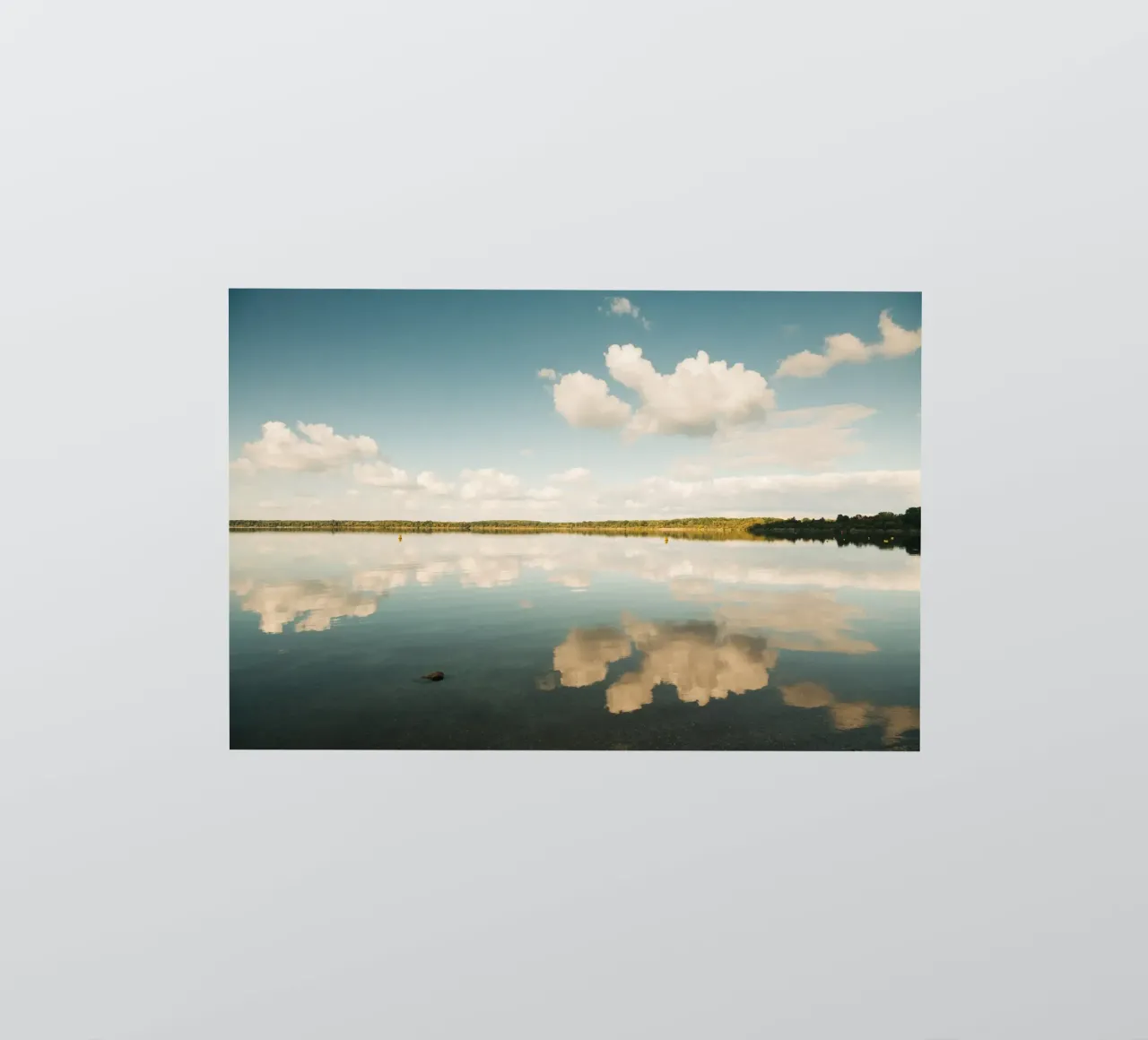 Cloud Mirror | Reflet des nuages à la surface de l'eau dans un lac autocollant de Bold and Retro