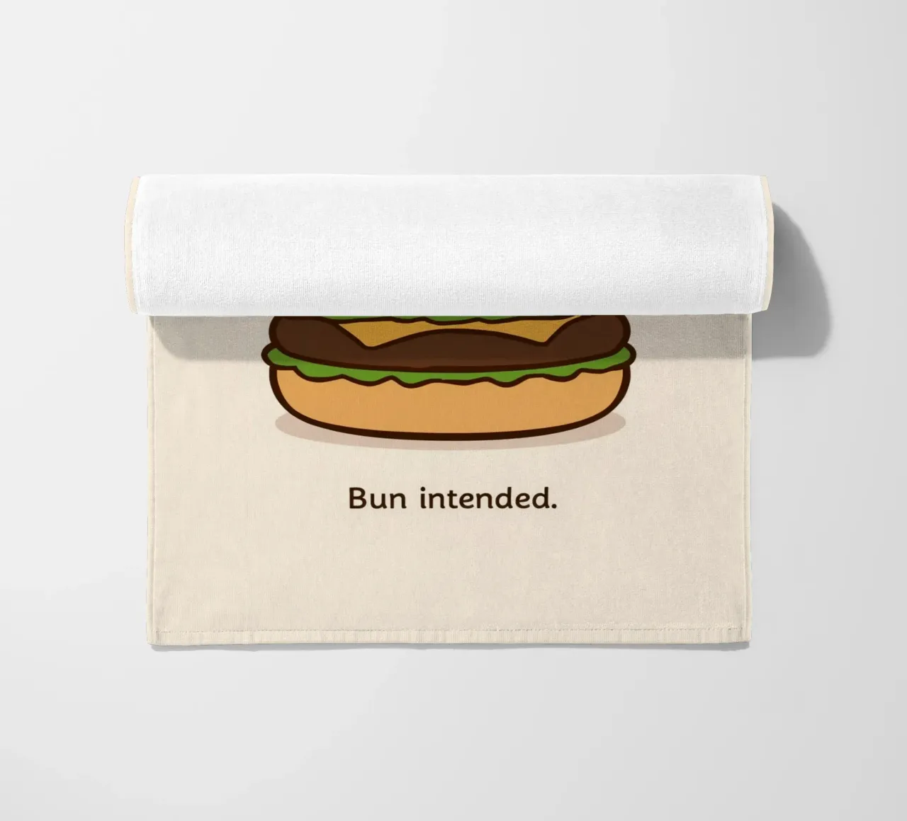 Un simpatico hamburger con "Bun Intended". telo mare da DesignDoodle