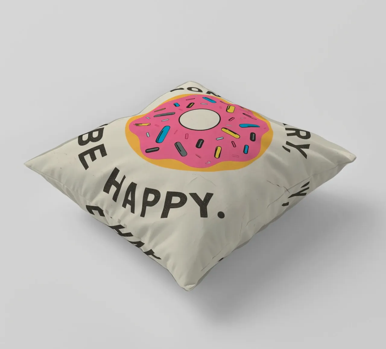 Ciambella con "Donut Worry Be Happy" (Non preoccuparti, sii felice) cuscino da DesignDoodle