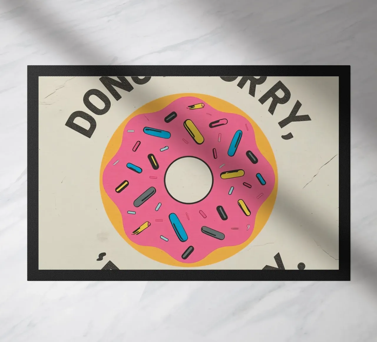 Ciambella con "Donut Worry Be Happy" (Non preoccuparti, sii felice) zerbino da DesignDoodle
